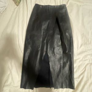 Sexy real leather pencil skirt with a front slit.